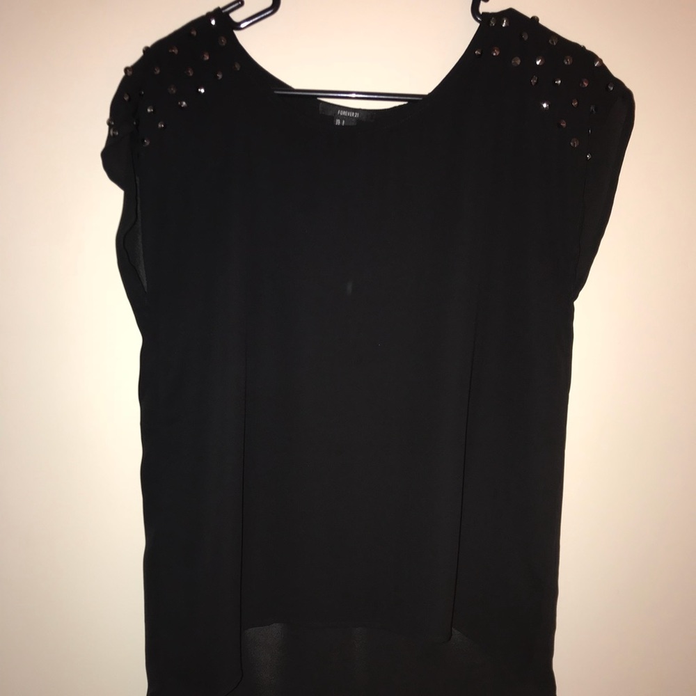 Shirt with studded shoulder